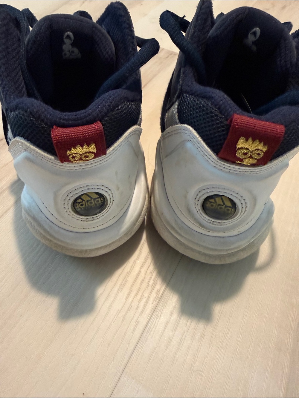 Kobe adidas top 10 retro basketball shoes. Bart Simpson accents- navy white gold